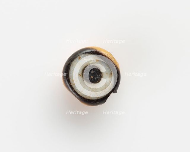 Eye-bead, with a lateral bore; the eyelet broken off, New Kingdom, 1550-1307 BCE. Creator: Unknown.