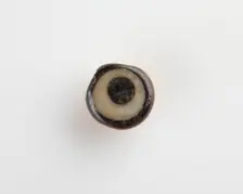 Eye-bead, with an eyelet and also a lateral bore, New Kingdom, 1550-1307 BCE. Creator: Unknown