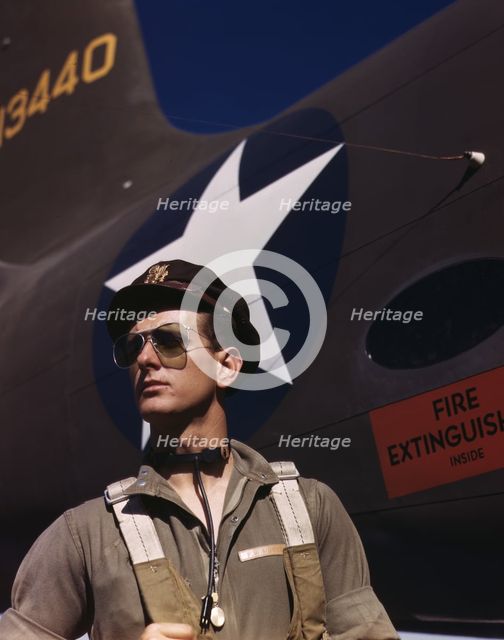F.W. Hunter, Army test pilot, Douglas Aircraft Company plant at Long Beach, Calif., 1942. Creator: Alfred T Palmer.