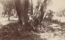 F.A. Williams resting against a tree, 1892. Creator: Unknown