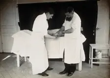 F Lejars demonstrating operation techniques, c1900s. Creator: E Guillot