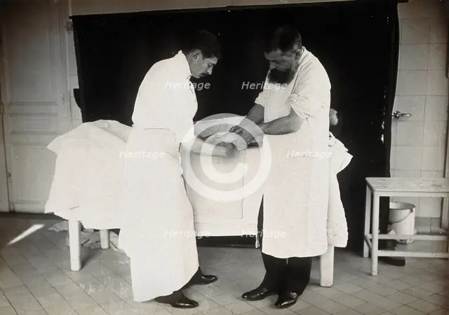 F  Lejars demonstrating operation techniques, c1900s. Creator: E Guillot.