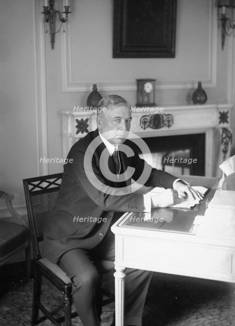 F. Lowden, seated at desk, writing, 1919. Creator: Bain News Service.
