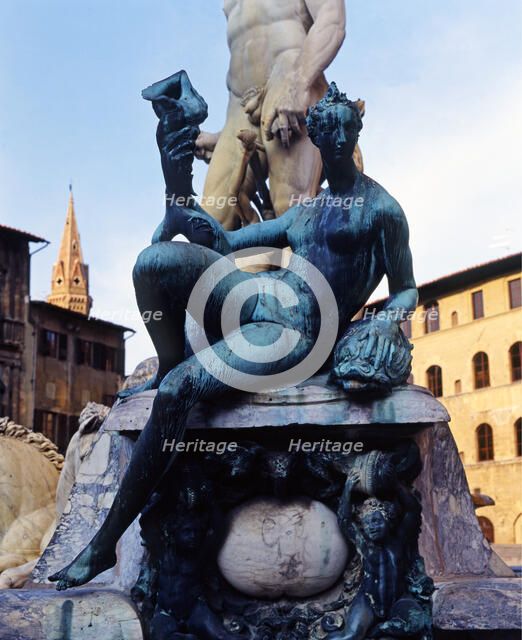 Fountain of Neptune in the Piazza della Signoria in Florence, detail of bronze figures surroundin…