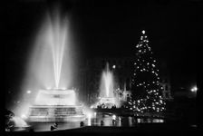 Fountains and the Christmas tree in Trafalgar Square, London, December 1948. Artist: Julian J Samuels