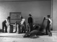 Four young men mixing fertilizers, Hampton Institute, Hampton, Va., 1899 or 1900. Creator: Frances Benjamin Johnston