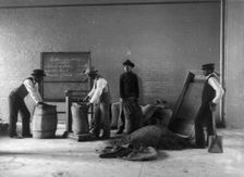 Four young men mixing fertilizers, Hampton Institute, Hampton, Va., 1899 or 1900. Creator: Frances Benjamin Johnston