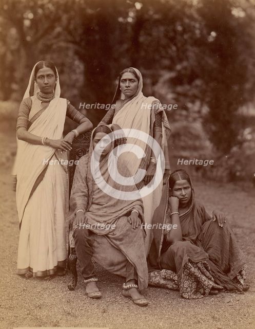 Four Hindu Women, One Seated in a Chair, Outdoors, 1860s-70s. Creator: Unknown.
