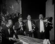 Four Male Civilians Standing Together. They Smile For the Camera, 1924. Creator: British Pathe Ltd