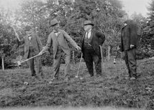 Four men playing croquet. Creator: Unknown