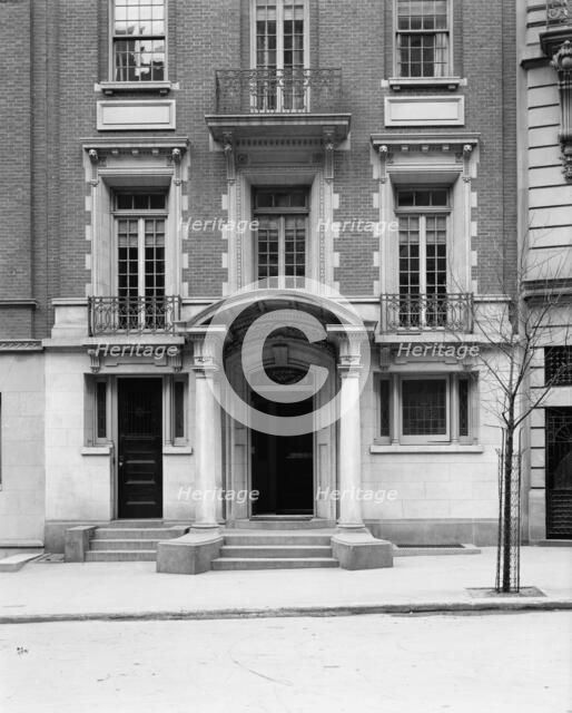 Four-story townhouse, entrance with pilasters and curved pediment, possibly New York, c1900-1905. Creator: William H. Jackson.