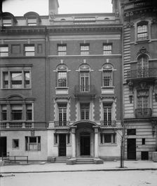 Four-story townhouse with curved pediment, possibly New York, N.Y., between 1900 and 1910. Creator: William H. Jackson