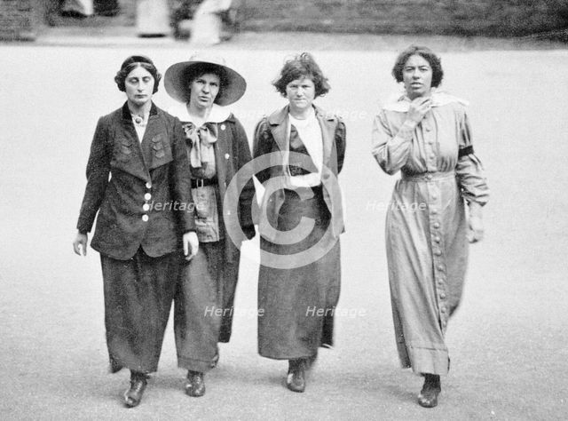 Four suffragettes exercising in the yard at Holloway Gaol, c1912. Creator: Unknown.