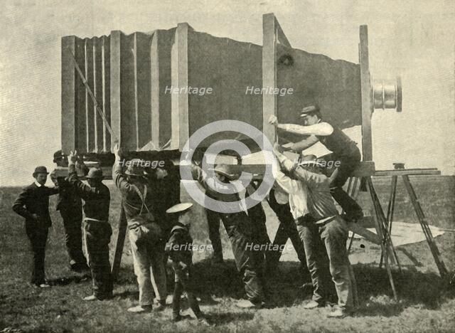 'Focussing The Gigantic Camera For Work', 1901. Creator: Unknown.