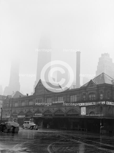 Foggy morning at Fulton fish market, New York City, 1943. Creator: Gordon Parks.