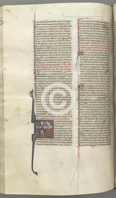 Fol. 222v, Psalm 52, historiated initial D, a fool naked but for a cloak, holding a bladder..., c. 1 Creator: Unknown.