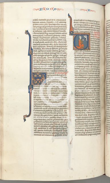 Fol. 354v, Amos, historiated initial V, Amos kneeling in prayer, bust of God above, c. 1275-1300. Creator: Unknown.