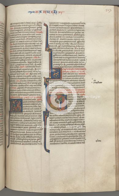 Fol. 317r, Baruch, historiated initial H, Baruch seated at a desk writing on a scroll, c. 1275-1300. Creator: Unknown.