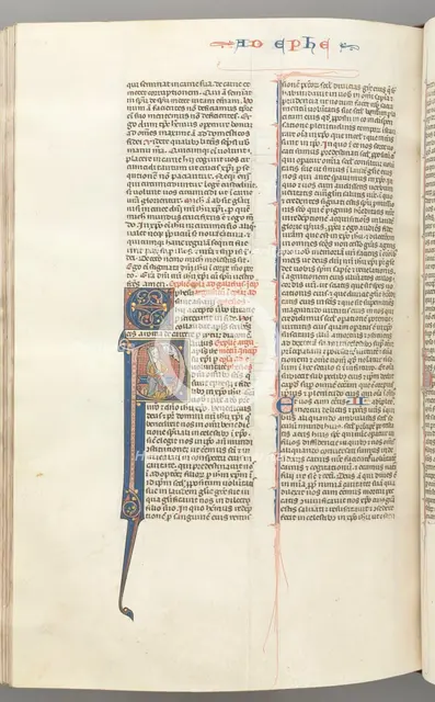 Fol. 450v, Ephesians, historiated initial P, Paul seated with a sword, the bust of God above, c. 127 Creator: Unknown.