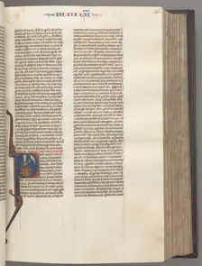 Fol. 86r, Judges, historiated initial R, Judah seated with a book talking to God, c. 1275-1300. Creator: Unknown