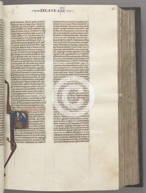 Fol. 86r, Judges, historiated initial R, Judah seated with a book talking to God, c. 1275-1300. Creator: Unknown.