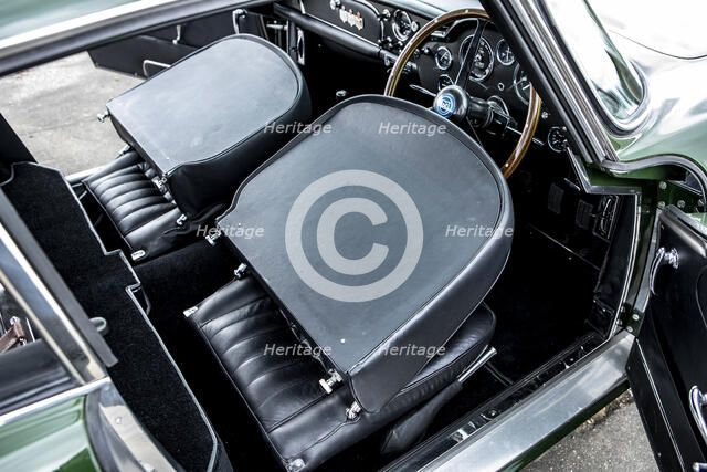 Folded down front seats of a 1961 Aston Martin DB4 GT previously owned by Donald Campbell. Creator: Unknown.