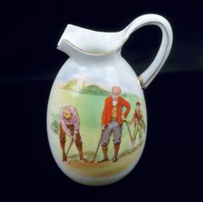 Foley/Shelley small cream jug with image of two golfers and caddy, c1930. Creator: Unknown