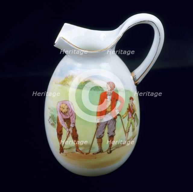 Foley/Shelley small cream jug with image of two golfers and caddy, c1930. Creator: Unknown.