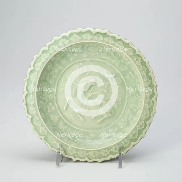 Foliate Dish with Bovine (Xiniu) Gazing at a Crescent Moon, Yuan dynasty (1279-1368), late 13th cent Creator: Unknown.