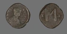 Follis (Coin) Portraying the Emperor Justin I or Justinian I, 6th century. Creator: Unknown