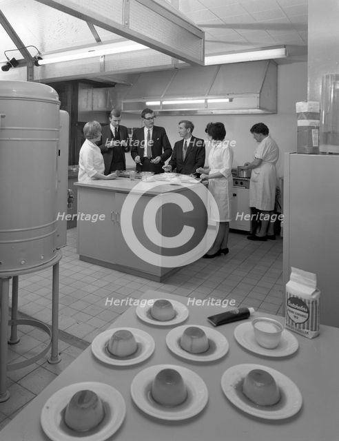Food tasting in a new experimental kitchen, Batchelors Foods, Sheffield, South Yorkshire, 1966. Creator: Michael Walters.