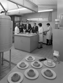 Food tasting in a new experimental kitchen, Batchelors Foods, Sheffield, South Yorkshire, 1966. Creator: Michael Walters