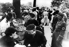 Food relief for refugees returned to Paris after the German capture of the city, 1940