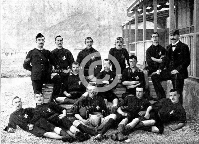 Football at Gibraltar: 2nd Battalion East Lancashire Regiment, winners of the Governor's Cup, 1895. Creator: Bruzon.