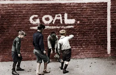 Football in the East End, London, 1926-1927.  Artist: Unknown.