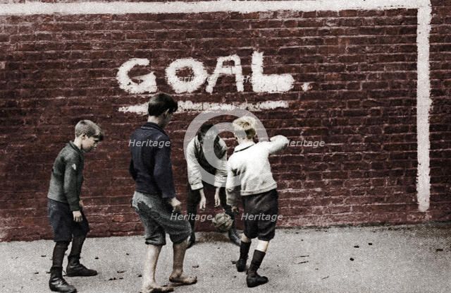 Football in the East End, London, 1926-1927.  Artist: Unknown.