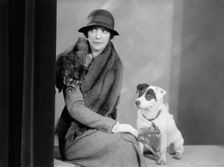 Foote, Walter A., Mrs. Portrait. with Dog, 1933. Creator: Harris & Ewing