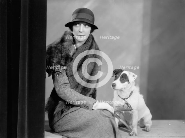 Foote, Walter A., Mrs. Portrait. with Dog, 1933. Creator: Harris & Ewing.