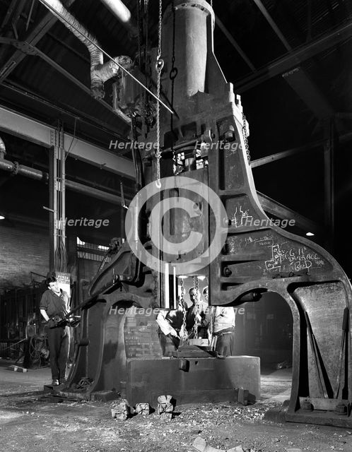 Forge in action at Edgar Allen's steel foundry, Sheffield, South Yorkshire, 1962. Creator: Michael Walters.
