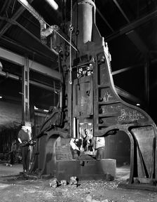 Forge in action at Edgar Allen's steel foundry, Sheffield, South Yorkshire, 1962. Creator: Michael Walters