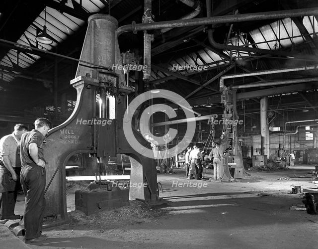 Forge in action at Edgar Allen's steel foundry, Sheffield, South Yorkshire, 1963. Creator: Michael Walters.