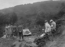 Ford 10 tourer of J McEvoy competing in the MCC Sporting Trial, 1935. Artist: Bill Brunell