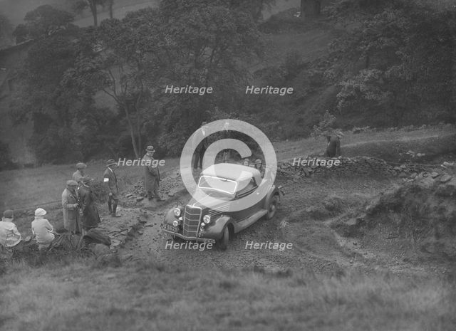 Ford V8 2-seater and dickey of JB Thompson competing in the MCC Sporting Trial, 1935. Artist: Bill Brunell.