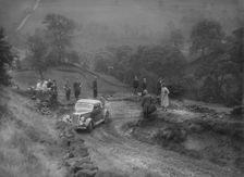 Ford V8 2-seater and dickey competing in the MCC Sporting Trial, 1935. Artist: Bill Brunell