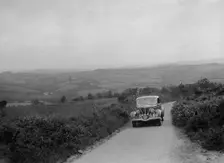 Ford V8 competing in the MCC Torquay Rally, 1938. Artist: Bill Brunell