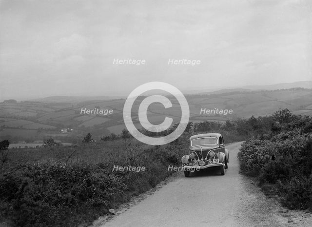 Ford V8 competing in the MCC Torquay Rally, 1938. Artist: Bill Brunell.