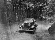 Ford V8 competing in the B&HMC Brighton-Beer Trial, Fingle Bridge Hill, Devon, 1934. Artist: Bill Brunell