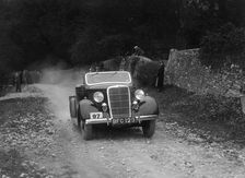 Ford V8 drophead competing in a motoring trial, Nailsworth Ladder, Gloucestershire, 1930s. Artist: Bill Brunell