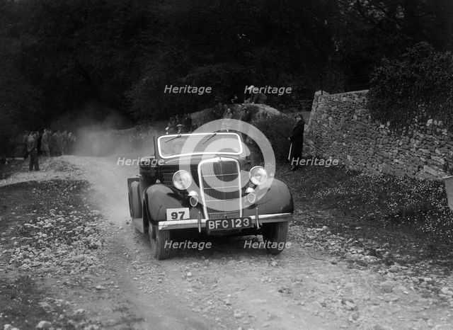 Ford V8 drophead competing in a motoring trial, Nailsworth Ladder, Gloucestershire, 1930s. Artist: Bill Brunell.
