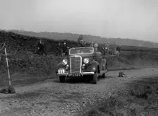 Ford V8 drophead of Viscount Chetwynd competing in the Sunbac Inter-Club Team Trial, 1935. Artist: Bill Brunell